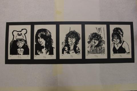  series of five black and white portraits, each depicting a different person. The portraits are arranged in a horizontal row and are framed together.