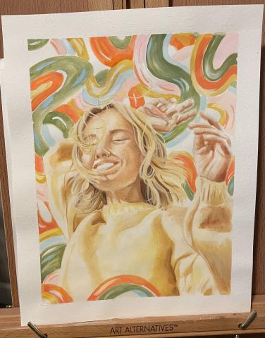 The artwork is a watercolor painting depicting a person with long, wavy hair wearing a beige sweater. The background features vibrant, swirling patterns in shades of green, orange, pink, and yellow