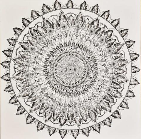 A pen ink drawing of an intricately designed Mandala dedicated to her grandmother from India