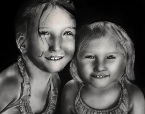 A charcoal drawing of two young sisters smiling in their bathing suits