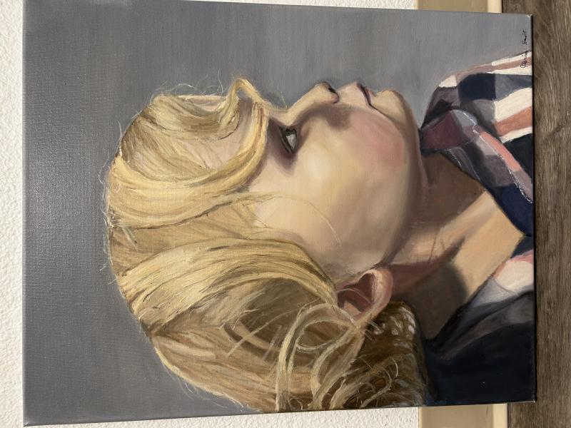 A realistic painting of a young child with blonde hair, viewed in profile against a gray background. The child is wearing a checkered shirt with red, white, and blue colors. 