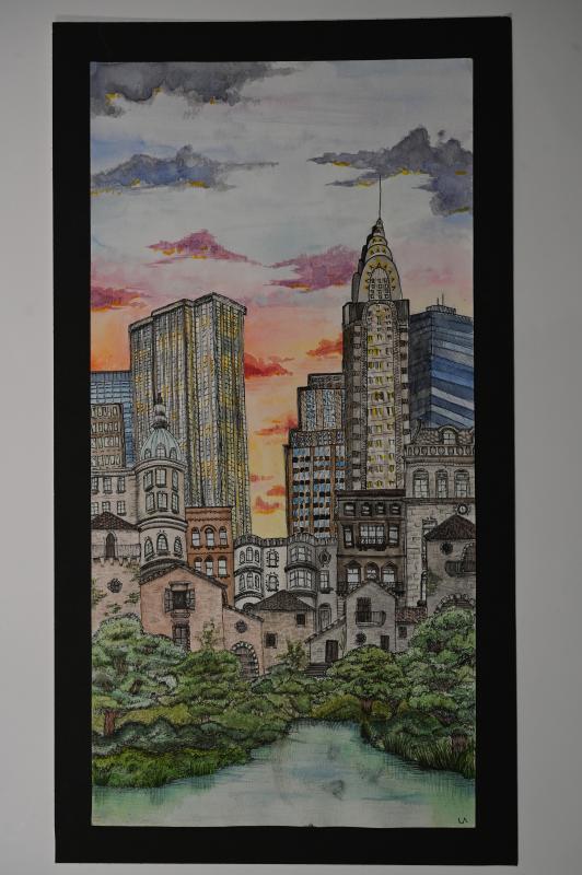 A detailed watercolor painting of a cityscape at sunset. The artwork features a mix of historic and modern buildings, including a prominent skyscraper with an ornate spire. The sky is painted with hues of orange, pink, and purple, reflecting the setting sun.