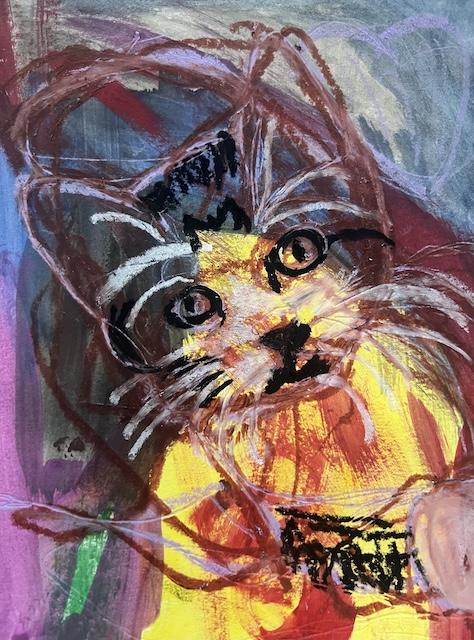 The image shows a colorful abstract painting of a cat with large, expressive eyes. 
