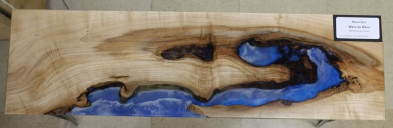 A Wood table combined with blue marbling Epoxy