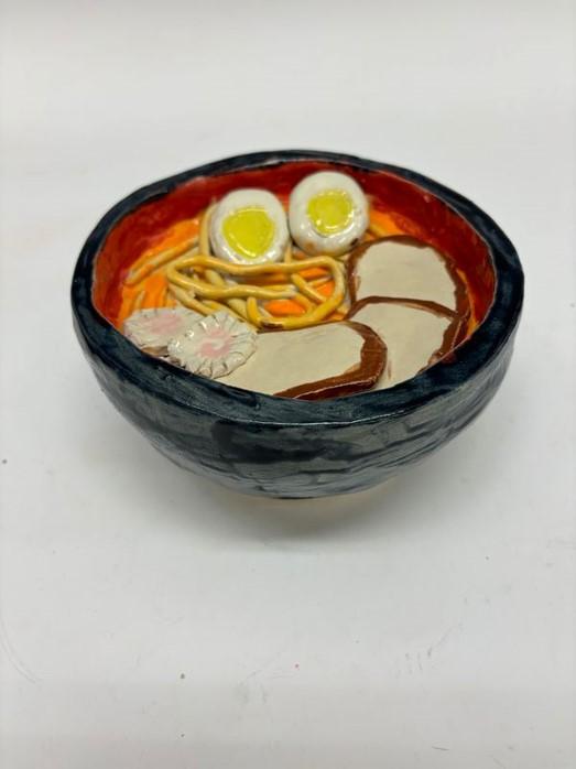 Ceramic bowl of Ramen with  detailed items for a realistic image