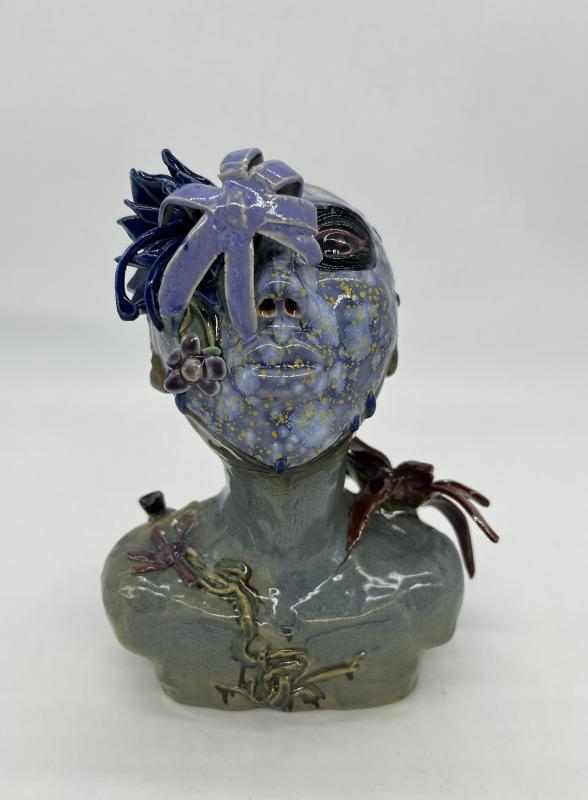 A bust of a person wearing a stapled on mask with flowers blooming out of their back, left eye, and shoulders. There are vines and roots settled right under their skin, and they look gaunt, with prominent collarbones. There's a coiled lump of vines in the center of their middle back.