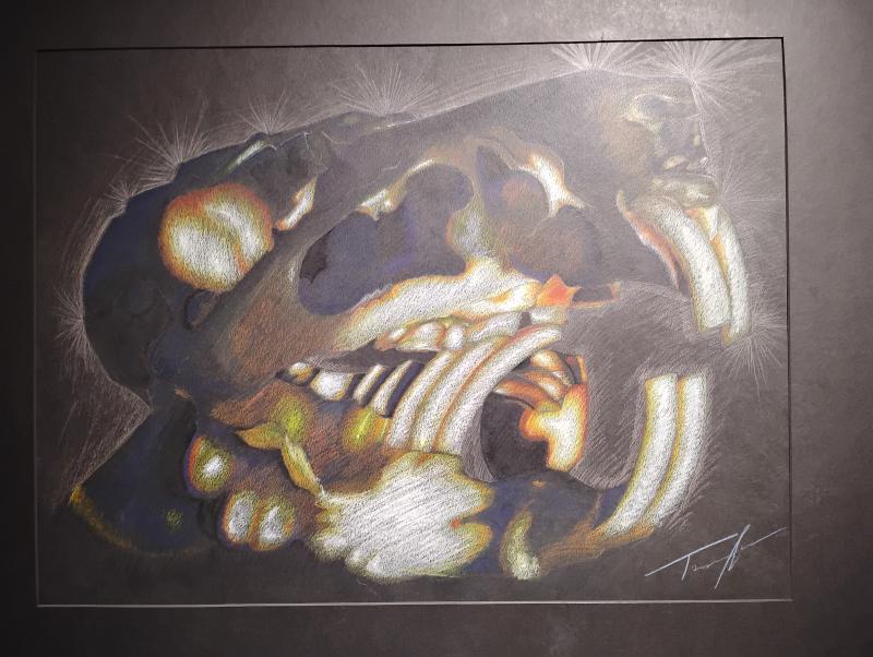 This piece is drawn on a black 24 by 18 inches of paper. On the paper is a guinea pig skull, that is a sort of block shape to it, broken by the jaw bone in the back and the buck teeth in the front. The eye socket, bottom center of the jaw, and most of the teeth, are colored mostly with white and have a fade from yellow to orange around it. Everything else mostly shaded in purples and blues, with the nostril socket having minimal yellow and orange.