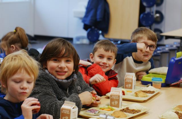 Kids having a meal